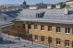 На Казанской улице, дом 11, литера А завершаются работы по капитальному ремонту кровли