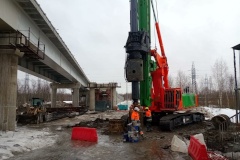 На Петрозаводском шоссе началось сооружение фундаментов будущих павильонов надземного пешеходного перехода