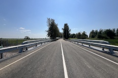 По поручению Александра Беглова в поселке Шушары завершен капитальный ремонт моста через безымянный ручей